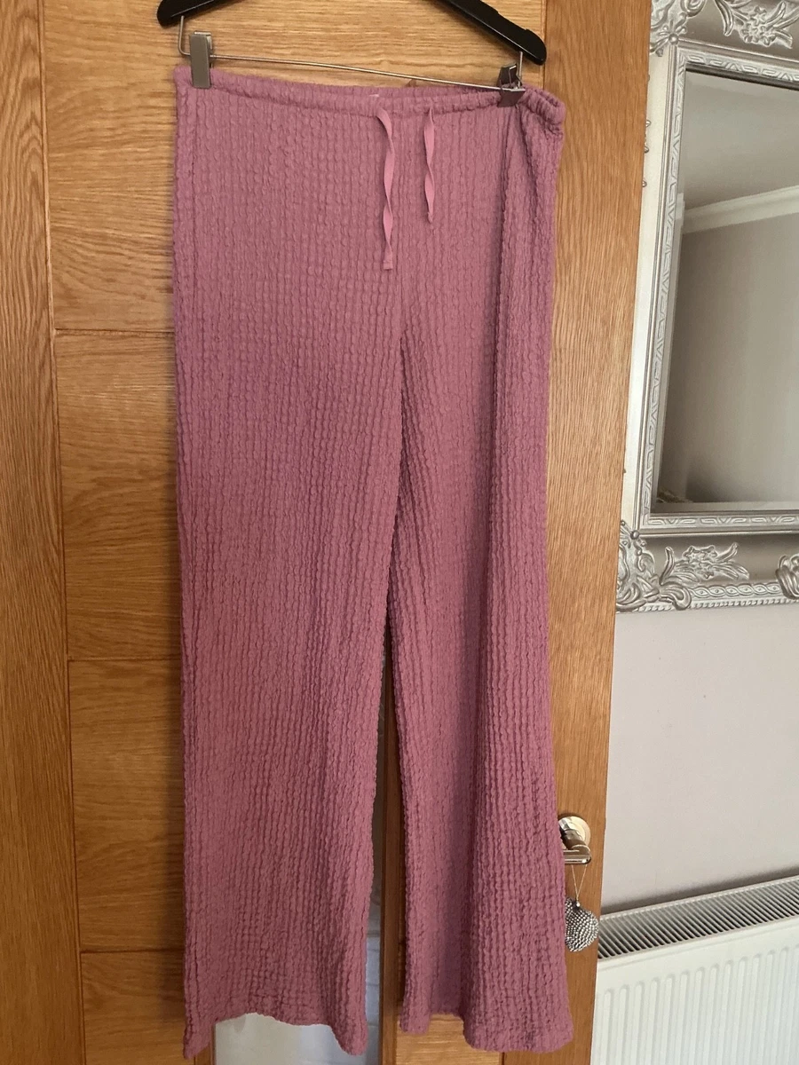 Pantalón elástico rosa H&M talla M