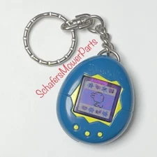 McDonalds 1998 Happy Meal Toys Tamagotchi Toyz #8 Light Up Toy Key Ring Blue