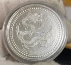 SAMOA 2024 ~ 2 TROY OUNCES  .999 SILVER  ~ YEAR   OF THE DRAGON ~ WITH CAPSULE
