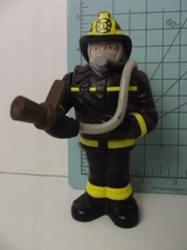 Vtg OddzON 5" Fireman Action Figure Fire Fighter Wearing Black Yellow 
