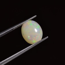 1,5 ct natürlicher äthiopischer Feueropal ovale Form Cabochon loser Edelstein...