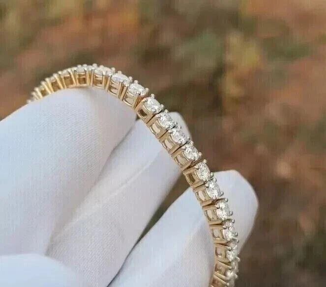 Brazalete de tenis de moissanita VVS1 de corte redondo de 4 mm enchapado en oro amarillo de 14 quilates Foto 2 de 4