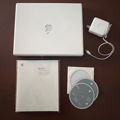Apple iBook G4 14" 2005 1,42GHz A1134, przewód zasilający / instrukcja obsługi / dyski rozruchowe - Zdjęcie 1 z 16