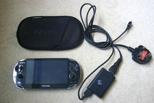 Sony PS Vita 1000 Console with 4GB Memory Card, Charger & Case.