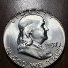 1957 Unc. Franklin Half Dollar Full Bell Lines Actual Coin. Higher grade Coin
