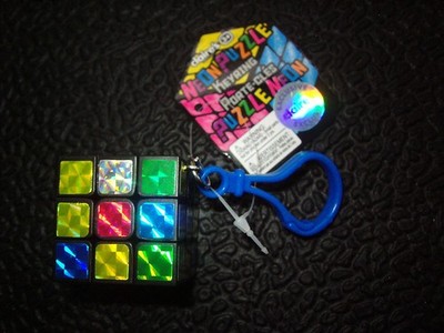 CLAIRES NEON PUZZLE KEYCHAIN + SPINMASTER Rubik's challenge level pocket Cube