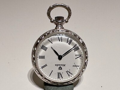 VINTAGE RARE SMALL SWISS RELIEF SILVER PLATED MECHANICAL POCKET WATCH ''NIVADA''
