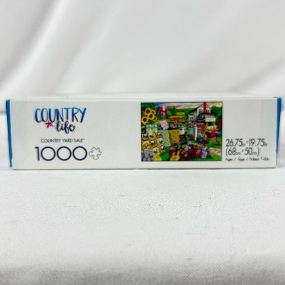 ¡SELLADO! Rompecabezas Buffalo Games Country Life “Country Yard Sale” Foto 3 de 4
