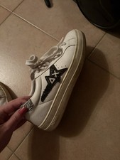 Weiße Sneaker mit schwarzem Stern - Gr. 38