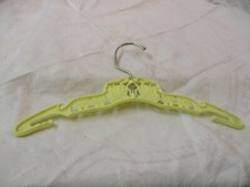 Vintage Clarolyte yellow plastic Child's Hanger with Trains Locomotives