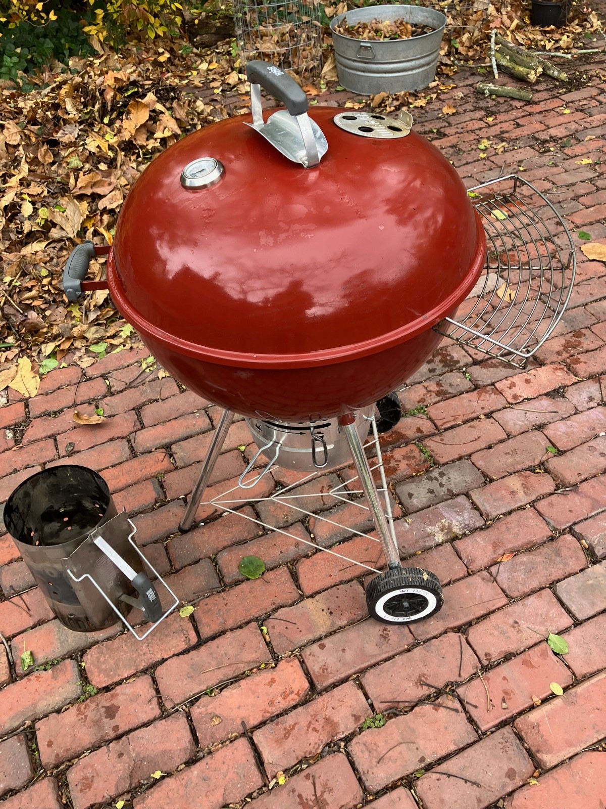 Red Weber 22-inch Kettle Grill with charcoal chimney