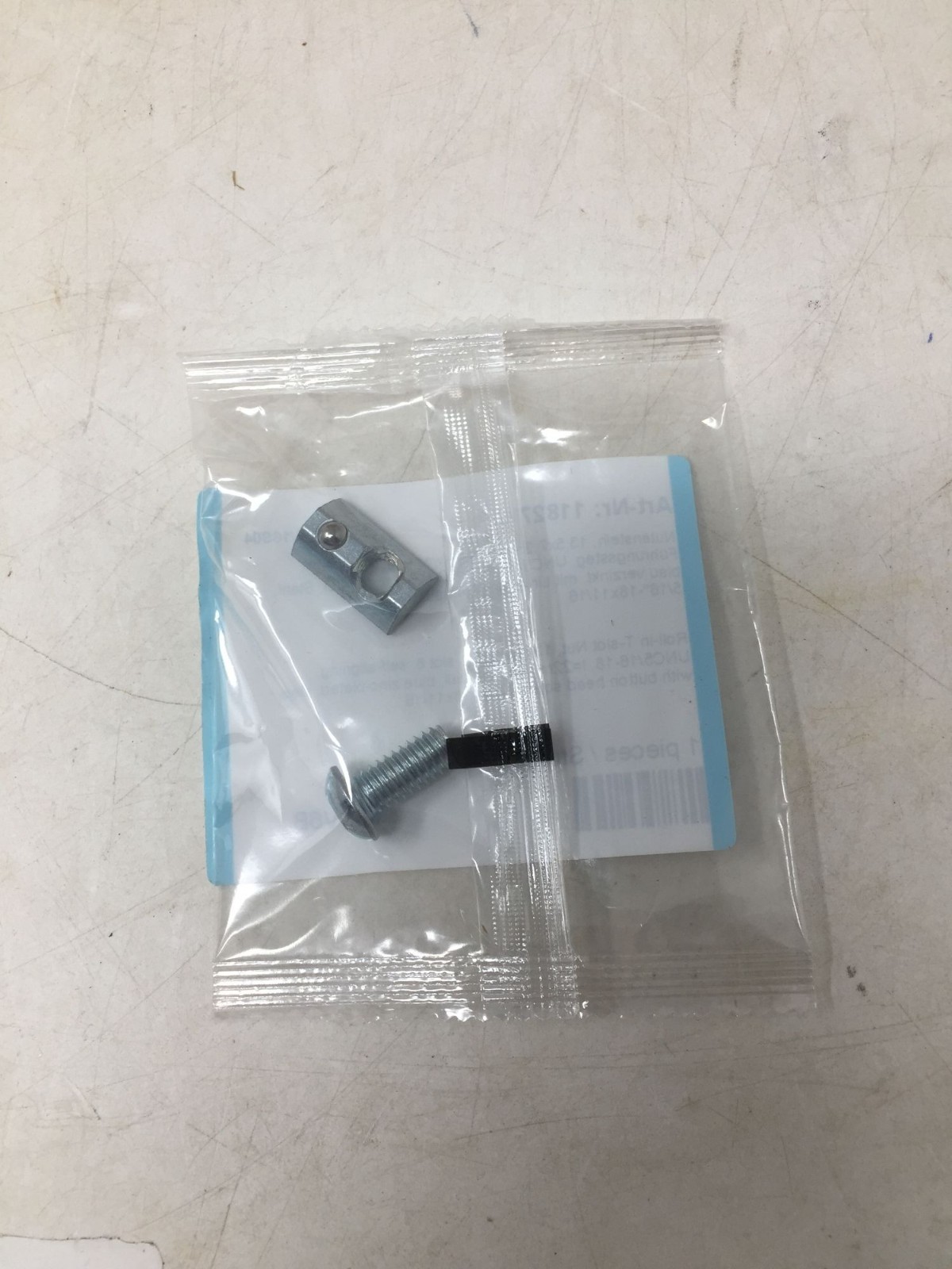 Roll-in T-Slot nut, 13,5x7mm, UNC 5/16-18, I=22mm - 09602U5/16S04