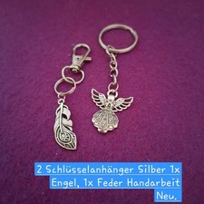 2 Schlüsselanhänger Silber 1x Feder, 1x Engel Handarbeit Neu.