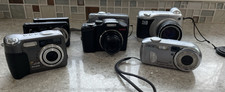 LOT OF 7 ASST'D COMPACT DIGITAL CAMERAS SONY, HP, KODAK, VIVTAR FOR PARTS
