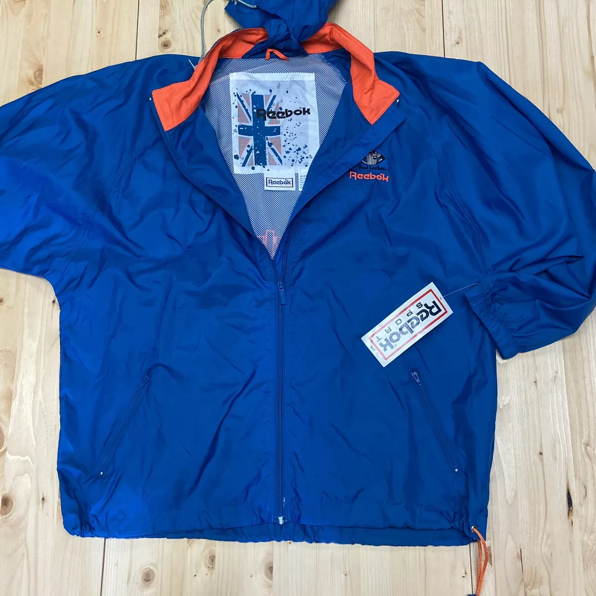 Reebok Jacket Mens XL Blue Track Windbreaker Foot Locker logo Hooded Vintage