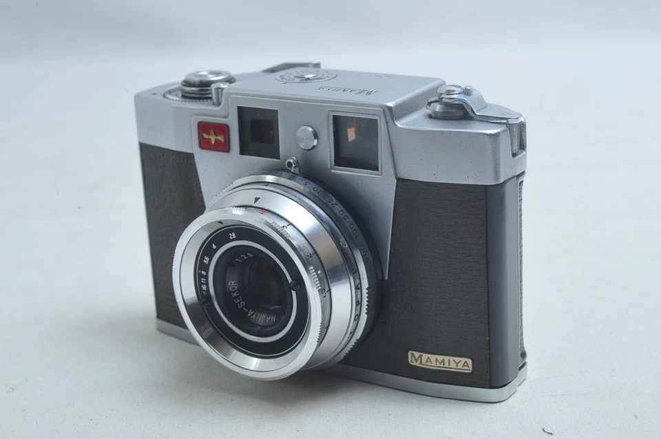 @ SakuraDo @ ¡Raro! @ Cámara telémetro Mamiya Sketch 24x24 mm formato cuadrado 35 mm Foto 2 de 4