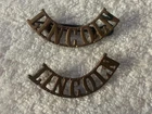 WW1 Military Cap Badge on Hoops Lincolnshire Regiment Shoulder Titles x 2