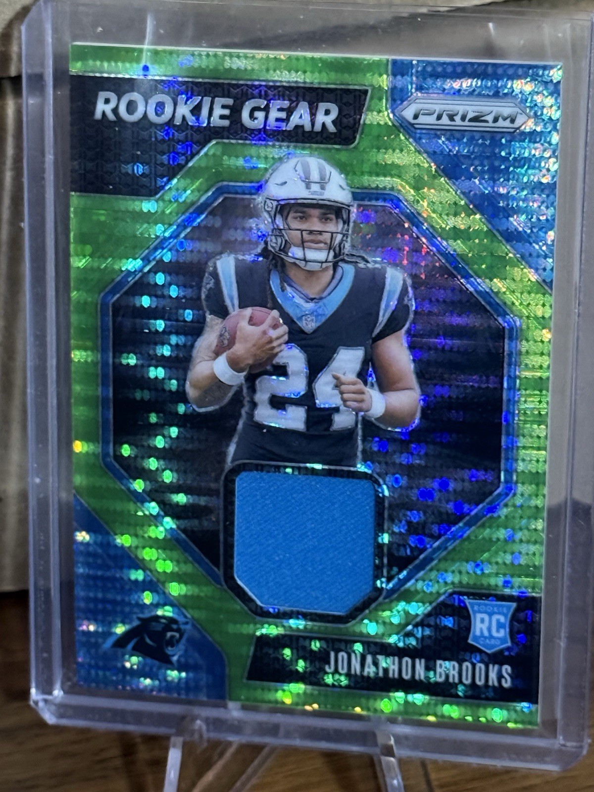 2024 Panini Prizm - Rookie Gear Jonathon Brooks  Green Pulsar Prizm (MEM, RC)
