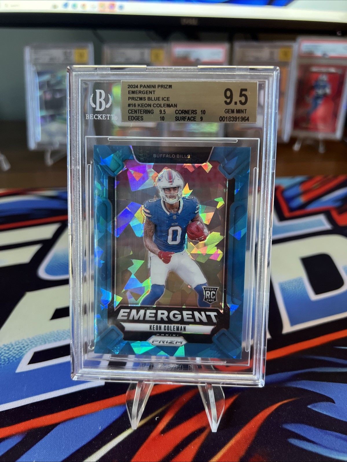 2024 Panini Prizm - Emergent Keon Coleman #16 Blue Ice Prizm /99 (RC)