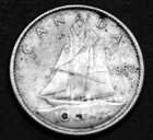 1957 10¢ silver coin that shows details