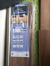 Image of Wickes Laminate Flooring 10mm Acacia Brown Oak