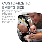 Britax Willow SC infant car seat with cow print pattern, showing adjustment points and warning label.