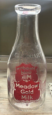 VINTAGE MEADOW GOLD 1 QUART MILK BOTTLE EMBOSSED WITH RED LETTERING (3C)