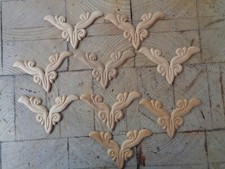 9 Stück Zierelemente Fichte, geschnitzt