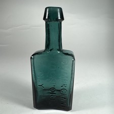 c1850s 5 in GW. Merchant Lockport, N Y Dark teal green Medicine Bottle Pontil