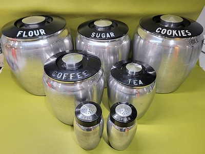 VINTAGE 1950s BLACK KROMEX 7 CANISTER SET INCLUDING COOKIES