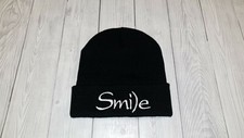 Cool  fancy black beanie hat with Smile embroidered sign. Original design.