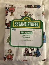 NWT 2 PIECE SESAME STREET CHRISTMAS STANDARD 100 COTTON PILLOWCASE SET