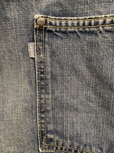 Pantalones de mezclilla vintage para hombre Levi's con pestaña plateada azul carpintero talla 36X34 - Imagen 11 de 11
