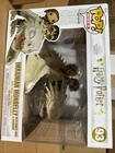 Funko Pop! Rides: Harry Potter - Harry, Hermione, & Ron Riding Gringgotts Dragon
