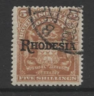 RHODESIA - 1909/12 5/- ORANGE FINE USED SG.110  (REF.G3)