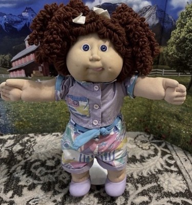 1986 cabbage patch popcorn hm# 11, double pony auburn Hair, violet eyes