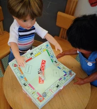 Vintage Basic Fun Monopoly mini board game w/ playing pieces for Riley Kish