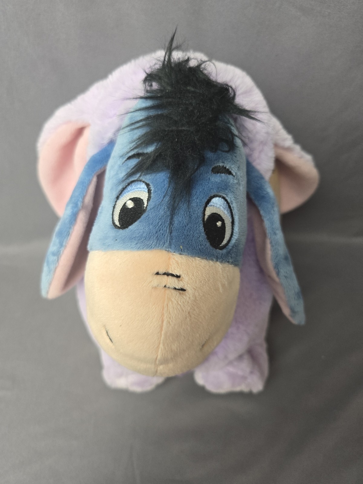 Disney store Easter eeyore dressed as bunny purple with Easter egg