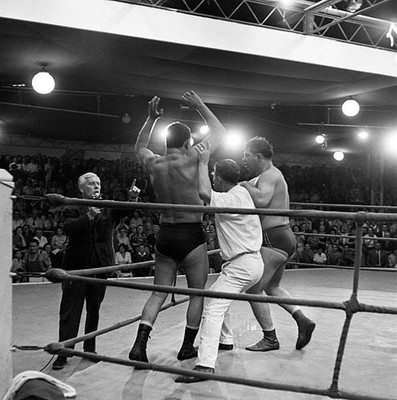Claude Darget commenting on a wrestling match organized in the lou- Old Photo