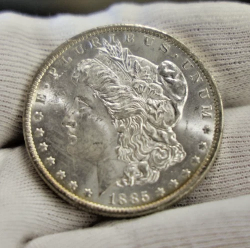 1885 O US Morgan Silver Dollar $1 Unc Edge Toning