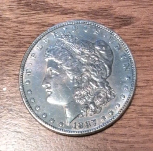 1887 P Morgan Silver Dollar Circulated Ungraded Fine–VF .7734 Troy Ounce Silver