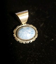 Native American "B Piaso Jr" signed Navajo sterling and denim pendant Shadow Box