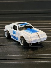 TYCO SLOT CAR 'TRANSFORMERS' 38 MUSTANG Turbo GLOW IN THE DARK  -Running-