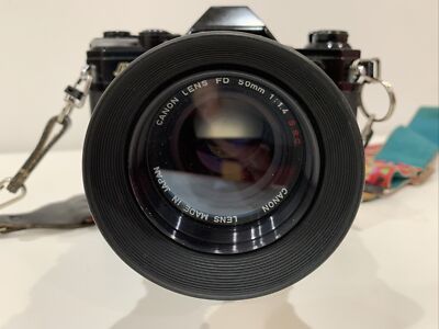 Canon AE-1 Black with FD 50mm f1.4 S.S.C. Lens And Power