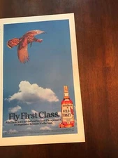 1986 VINTAGE 7.5X12.5 PRINT Ad FOR FLY FIRST CLASS WITH Wild Turkey Whiskey