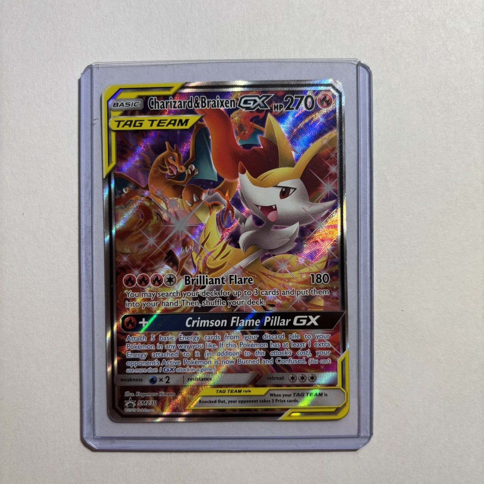Charizard and Braixen GX SM230 Near Mint Pokemon Card