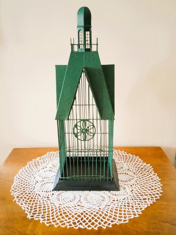 Decorative green steel birdcage 17" tall and base 6 3/4" x 6 3/4".