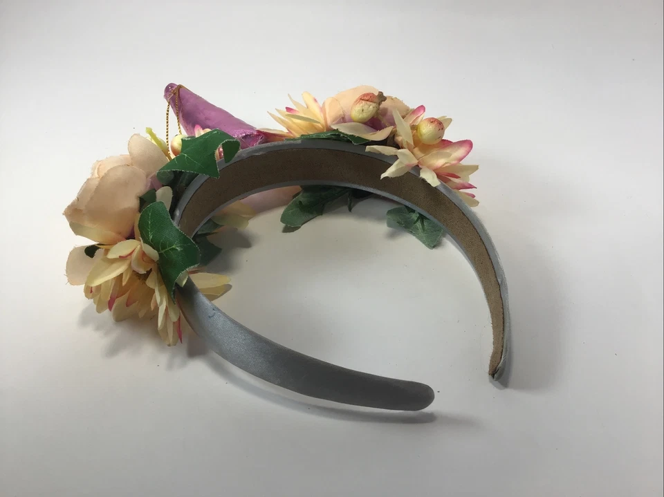 Diadema mágica de unicornio de cuento de hadas con flores Foto 3 de 4