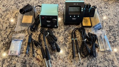 Two Weller Soldering Stations, WESD51 and WD1 with lots of accessories.