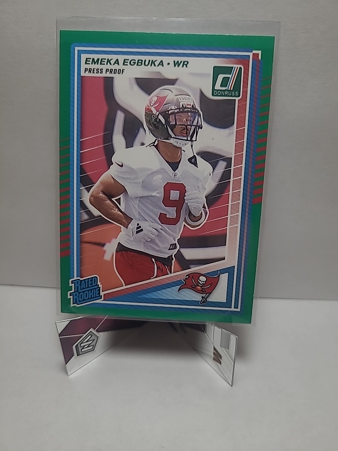2025 Panini Donruss - Rated Rookie Emeka Egbuka #375 Press Proof Green (RC)